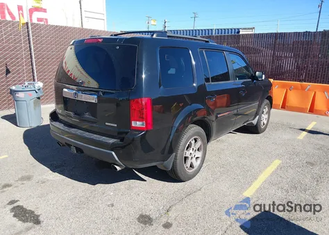 2010 Honda Pilot Touring из США, поврежденный, VIN 5FNYF3H94AB013651